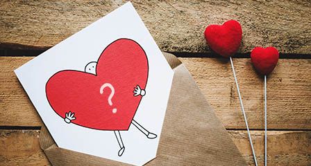 valentine card with heart and question mark